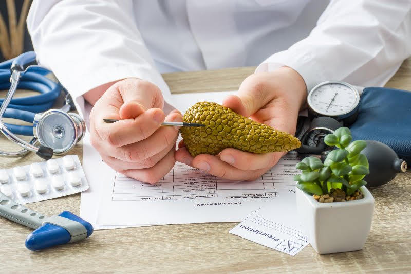 Doctor explaining to patient about pancreatic cancer.