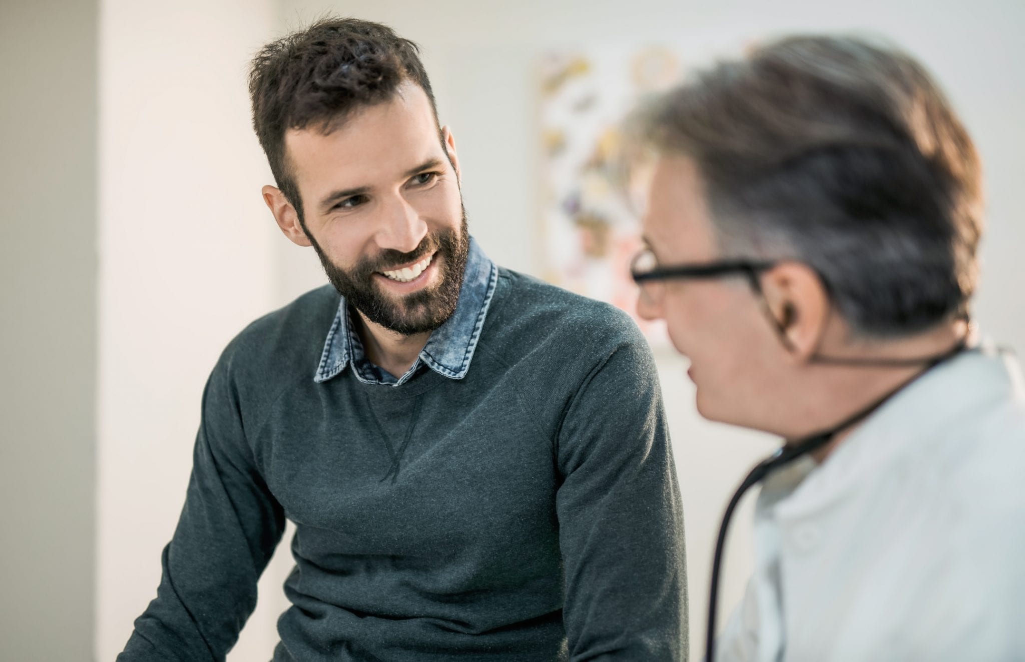 man talking with doctor