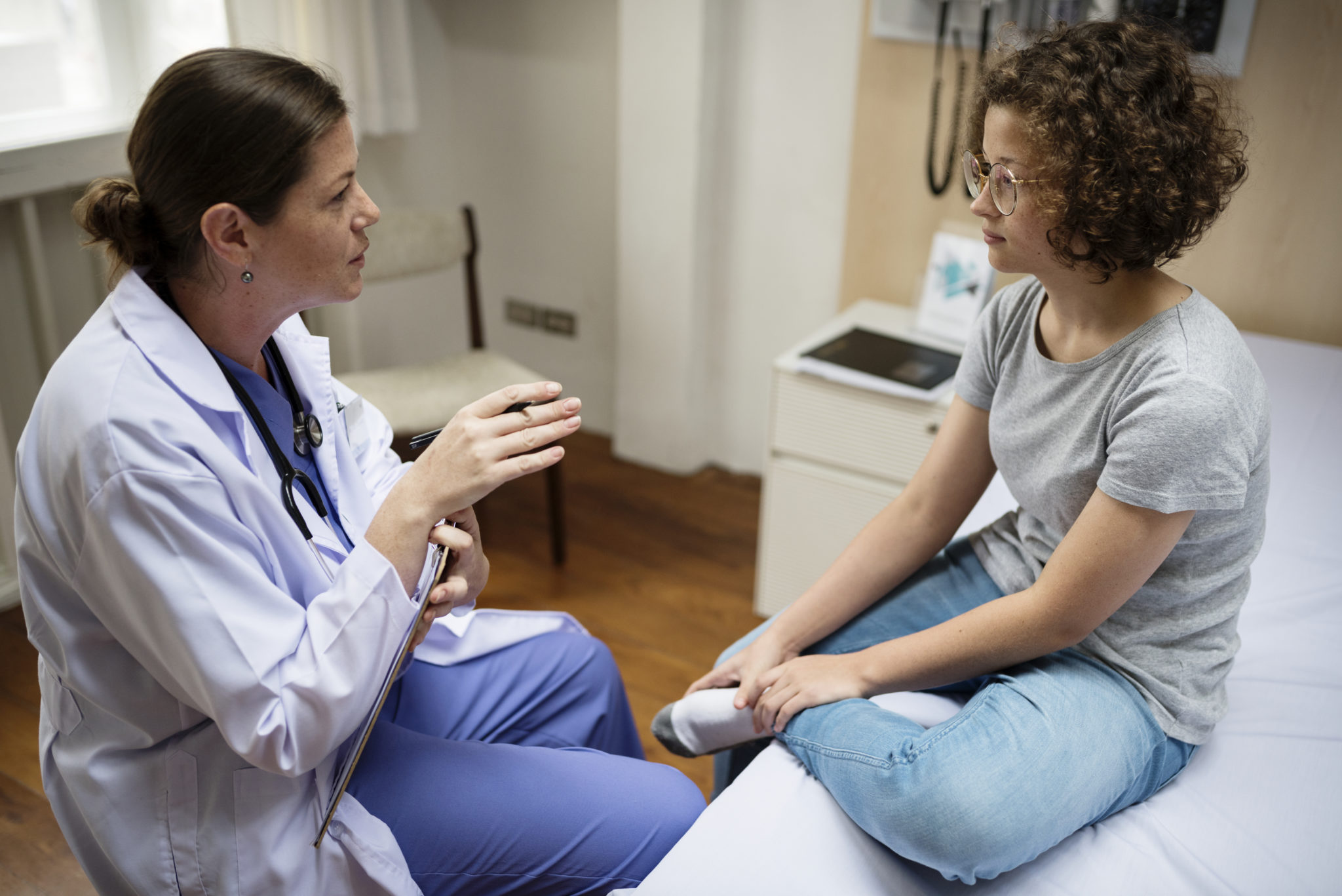 Kid and her pediatrician