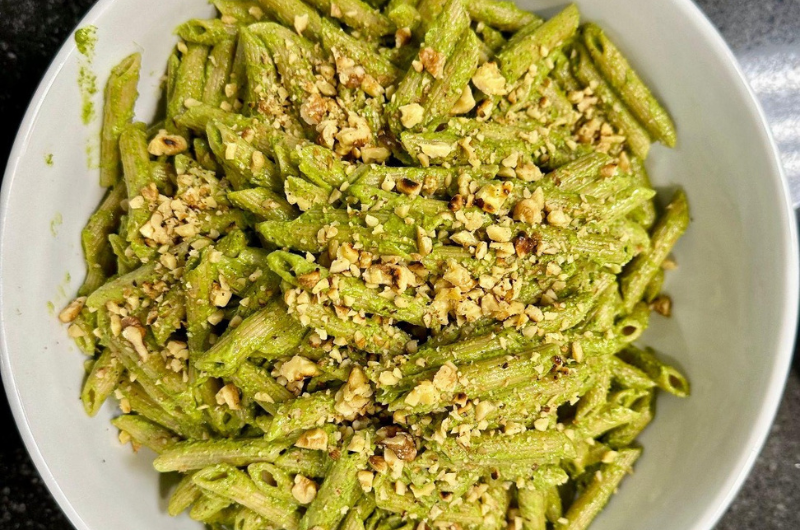 A bowl of basil walnut pesto with migraine-fighting magnesium.